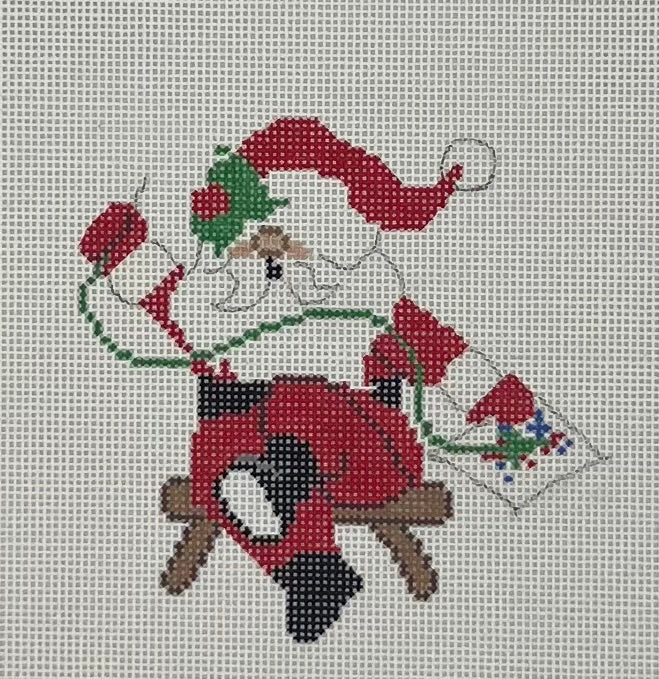 Needlepointing Santa