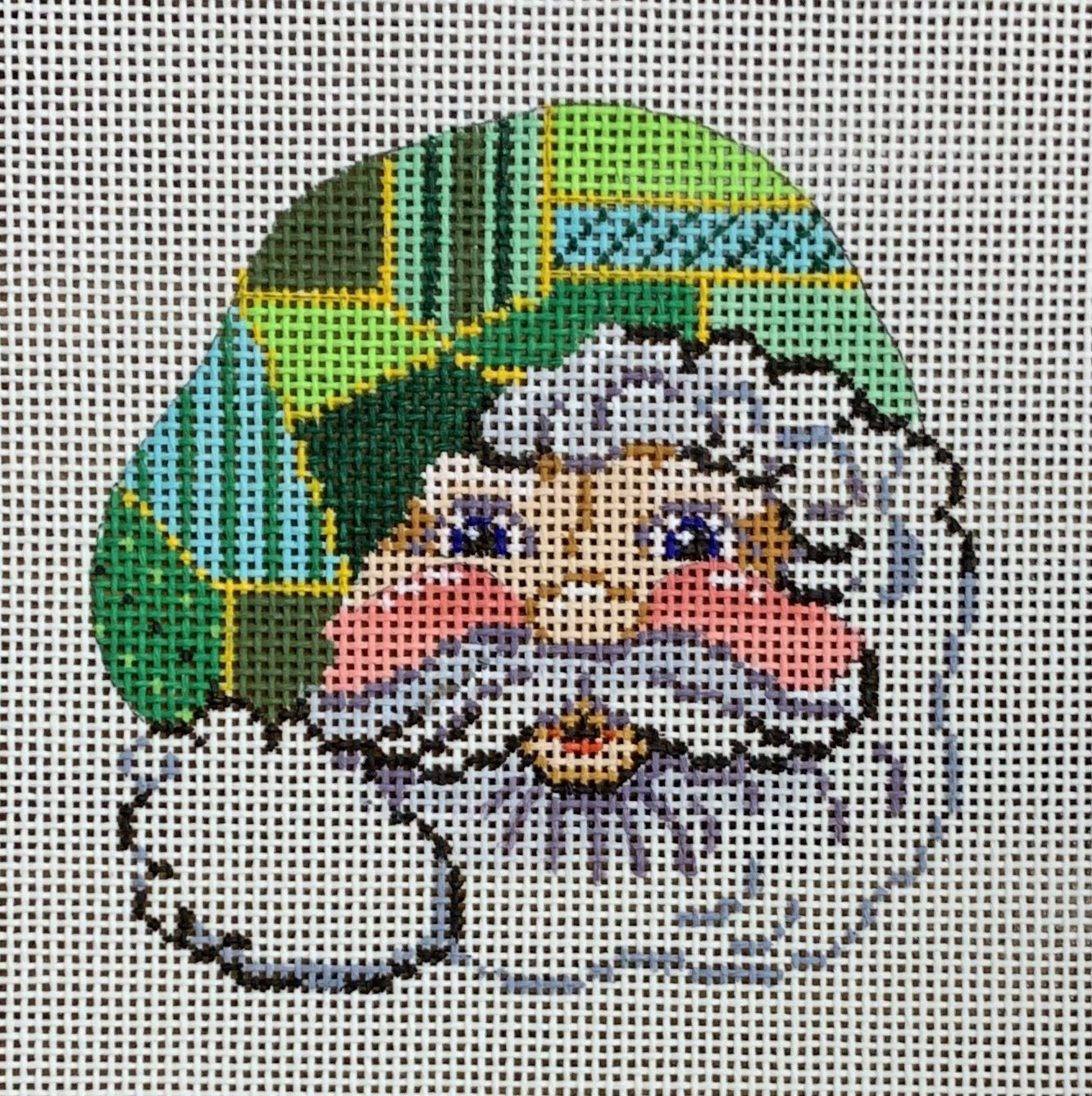 Santa Face w/ Green Patchwork Hat