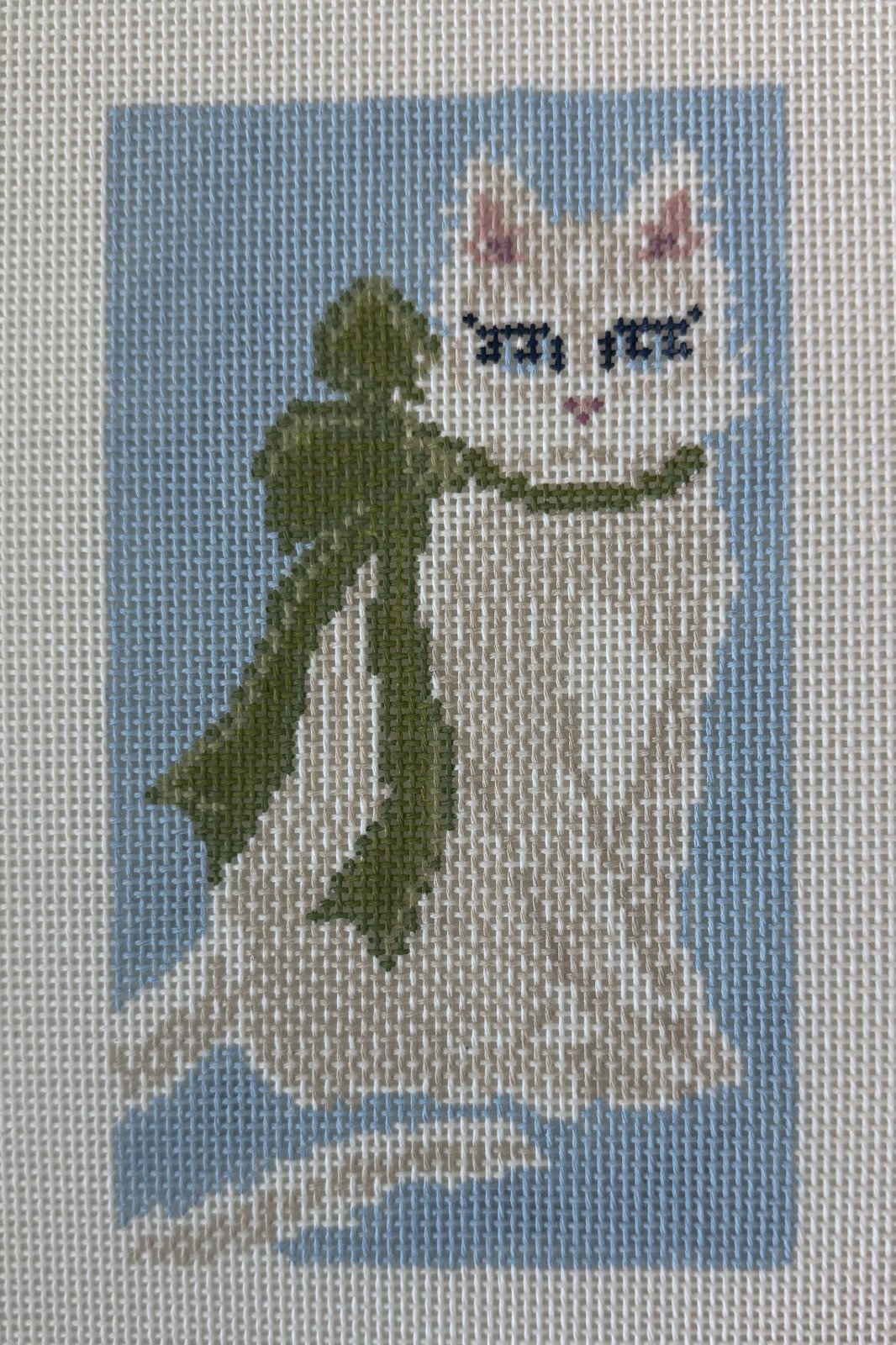 White Cat with Green Bow